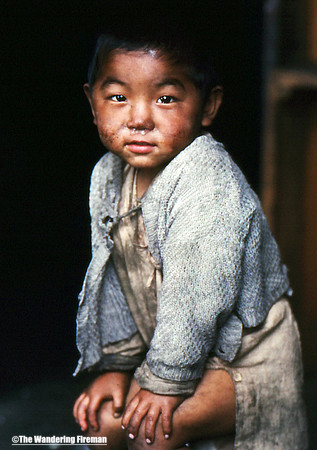 Young Nepalese boy looing at the camera
