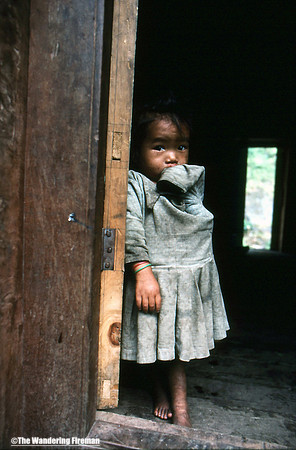 Young Nepalese girl in a doorway