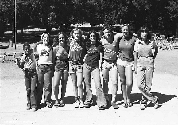 Us with the girls in the kids camp in California