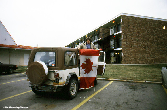 Bill waving the flag at one of our motel stops on the way to California