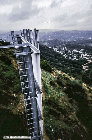 Looking out over Hollywood California while sitting atop the famous Hollywood sign-1