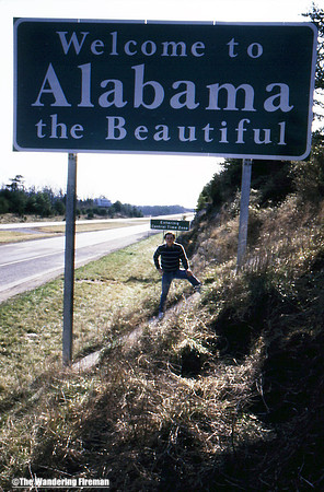 Me standing in front of the Alabama State liner on our road trip to California