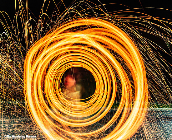 Steel wool spinning and burning abstract graphic art