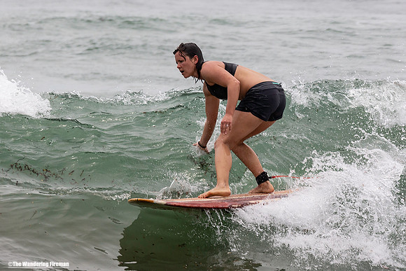 Surfer on a beach in Bali Indonesia