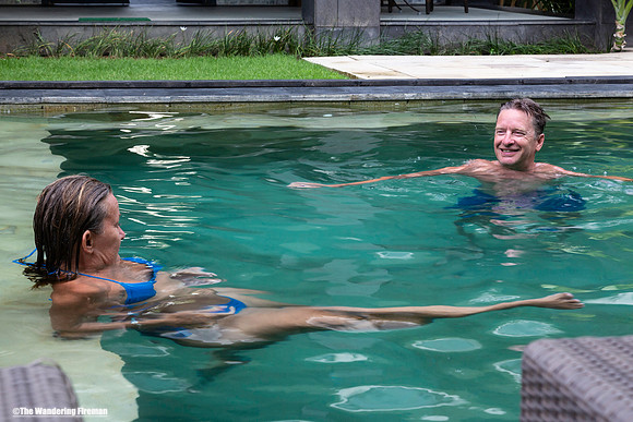 Two friends in the swimming pool in Bali Indonesia