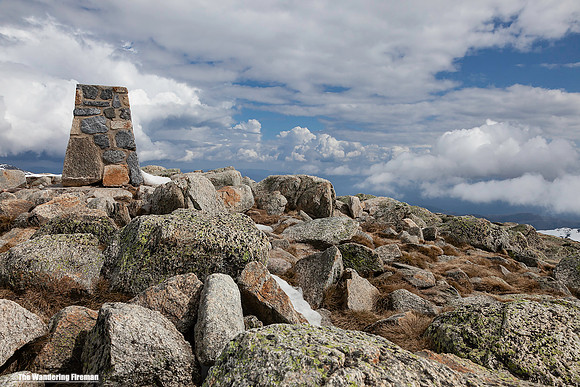 The stone marker for the summit of Kosciuszko in Australia