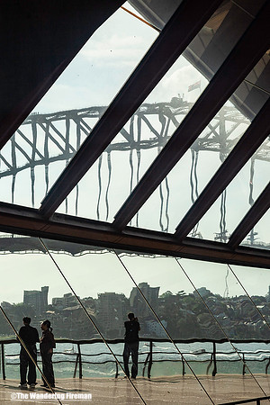 The Sydney Harbour Bridge as seen through the Sydney Opera House in Sydney Australia