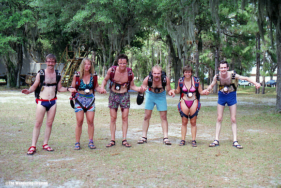 Group of skydivers preparing to make a nude skydive