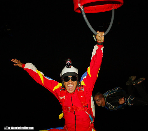 Skydiver with tube grinning for the camera