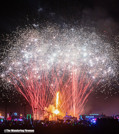 Sparkling fireworks over the man in Black Rock City Nevada
